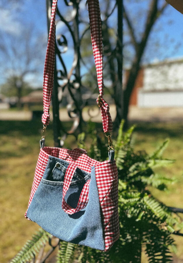 Each denim bag is made from thrifted jeans, making every piece one of a kind. No two are exactly alike. Choose your fabric pattern to create a bag that’s uniquely yours. $50