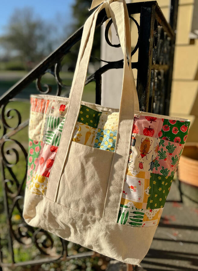 A little structure, a little patchwork, and a lot of personality! This canvas tote is made for everyday use with two exterior pockets and a soft cotton lining. Customize your patchwork colors to make it yours. $50